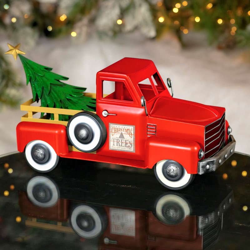 toy red truck with christmas tree