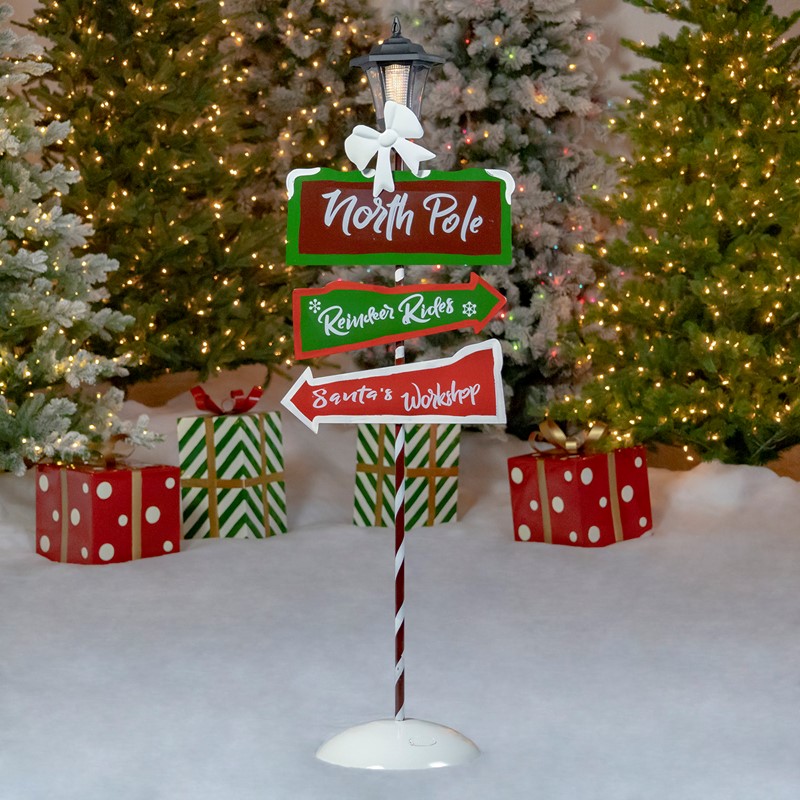 Zaer Ltd. International 50" Tall Standing "North Pole" Solar Lantern with Crossing Signs ZR170877