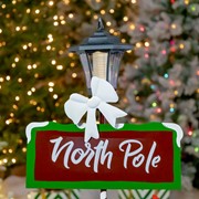 Zaer Ltd. International 50" Tall Standing "North Pole" Solar Lantern with Crossing Signs ZR170877 View 3